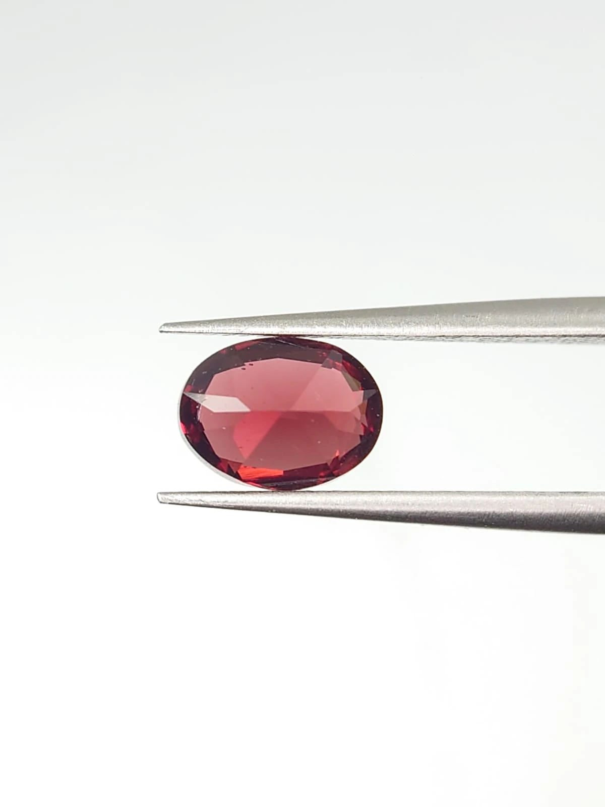 1.56ct Natural Malaya Garnet Oval Cut From Tanzania — view 3